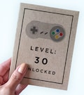 Video Game Birthday Card - Level 30 Unlocked - Customizable for the Appropriate Age - Level Up Card -  A2 Greeting Card - Kraft Card product logo