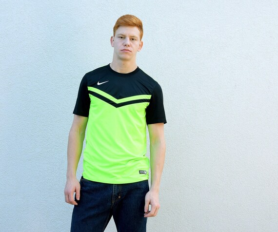 fluorescent green nike shirt