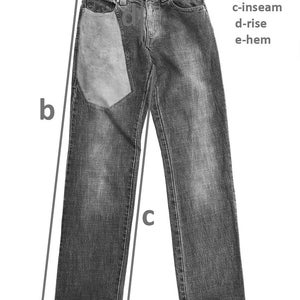 May include: A pair of dark gray denim jeans with a patch pocket on the left leg. The jeans are measured for waist, length, inseam, rise, and hem.