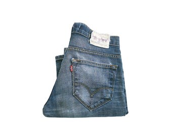 Pantalones vaqueros desgastados estilo vaquero Levi's 519 vintage