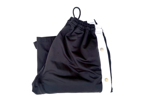 These track pants have buttons on the side that can be opened. They are  called popper pants. | Track pants outfit, Tracksuit pants, Sports trousers