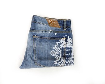 Vintage 90-tals hiphop-jeans: sliten denim