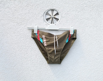Bañador tipo slip retro verde oliva para hombre, estilo vintage de los años 70, talla 7