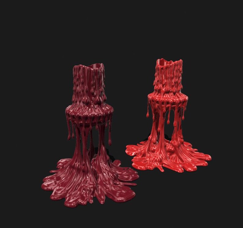 May include: Two candle holders with a melted wax design. One is a deep burgundy color, and the other is a bright red. The wax appears to be dripping down the sides and pooling at the base, creating a unique and artistic look.