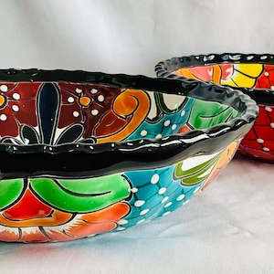 Talavera Bowl with slightly wavy edge.