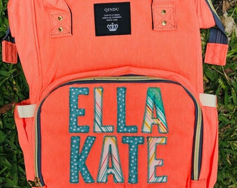 coral diaper bag backpack