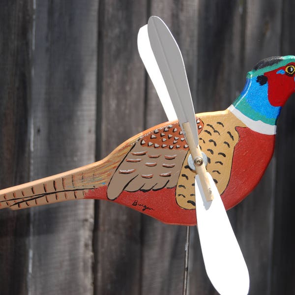 Ring-necked Pheasant Whirligig - a beautiful game bird frequently spotted in agricultural fields.