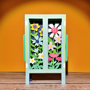Cartão de felicitações pop-up de armário de flores silvestres