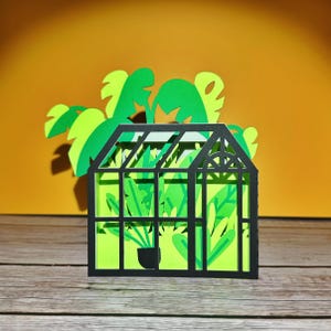 Cartão de felicitações pop-up com efeito de estufa