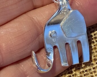Solid silver unique  elephant pendant recycled from antique desert fork , inc sterling silver chain