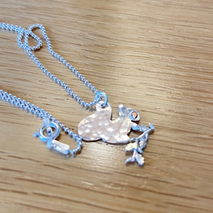 Sterling silver unique squirrel pendant. Inc sterling silver chain.