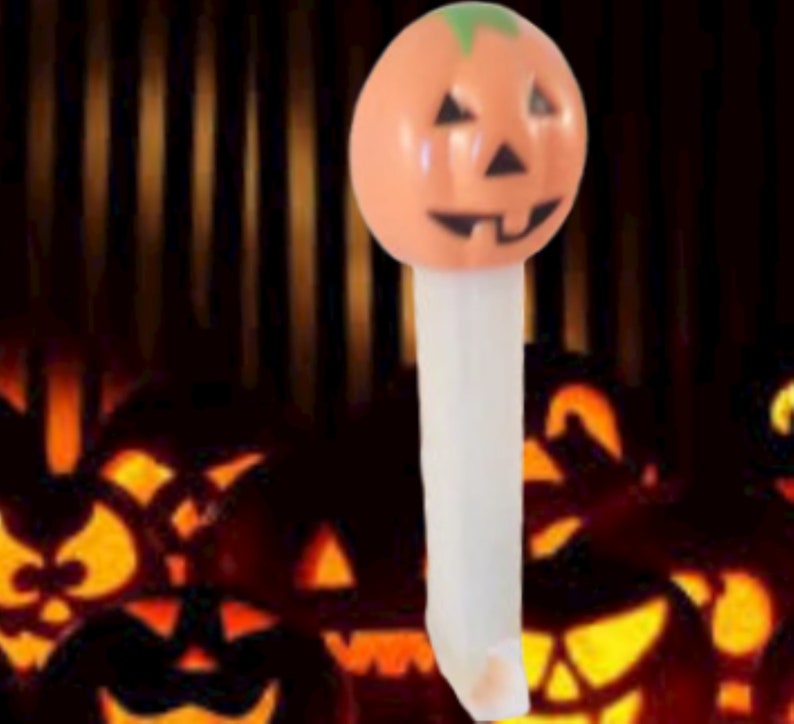 Pumpkin PEZ Candy Dispenser Glow in the Dark White Orange Jack O Lantern Halloween Collectible Toy Made in Hungary