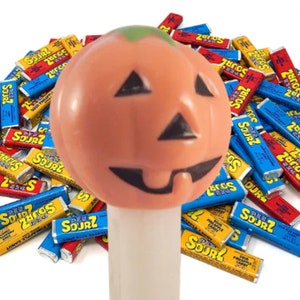 Pumpkin PEZ Candy Dispenser Glow in the Dark White Orange Jack O Lantern Halloween Collectible Toy Made in Hungary