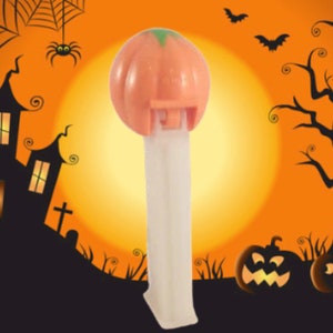 Pumpkin PEZ Candy Dispenser Glow in the Dark White Orange Jack O Lantern Halloween Collectible Toy Made in Hungary