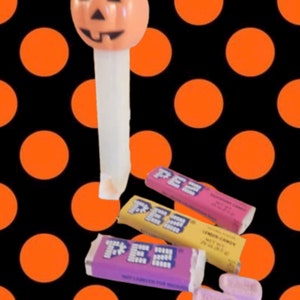 Pumpkin PEZ Candy Dispenser Glow in the Dark White Orange Jack O Lantern Halloween Collectible Toy Made in Hungary