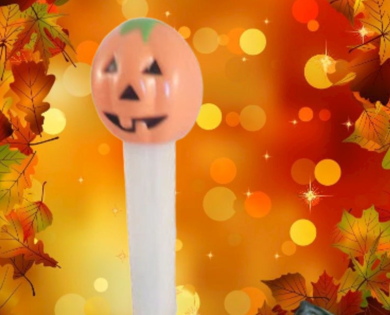 Pumpkin PEZ Candy Dispenser Glow in the Dark White Orange Jack O Lantern Halloween Collectible Toy Made in Hungary image 1