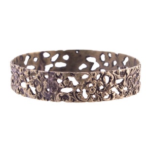 Pierced Gold Tone Bangle