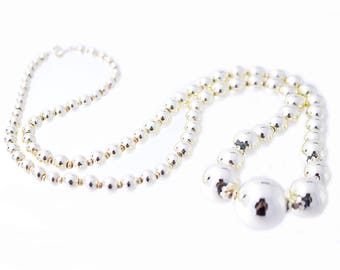 Gold Tone Graduated Bead Necklace
