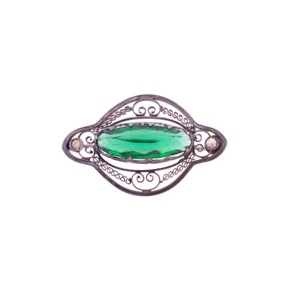 Green stone best sale brooch