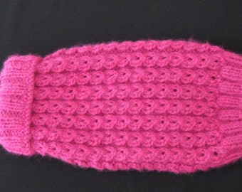 MEDIUM dog sweater in hot pink, hand knit in a beautiful and unique pattern.  This sweater is very thick and very warm for cold winter days!