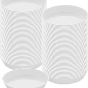 May include: A stack of 50 white plastic plant saucers. The saucers are round and have a smooth surface. They are stacked in two piles, each pile containing 25 saucers.