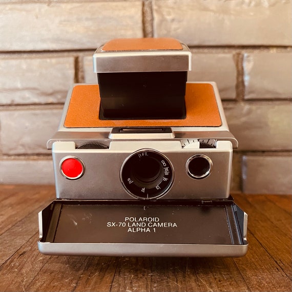 【訳あり】Polaroid SX-70 アルファ
ポラロイドカメラ Polaroid SX-70 Alpha Gold-Plated Folding Instant Film Camera