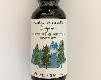 May include: A brown glass bottle with a dropper top, labeled "Nature craft Organic WHITE PINE NEEDLE tincture" with a graphic of pine trees and mountains. The bottle contains 1 fl. oz. / 30 mL of liquid.