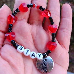 Stray Kids &quot;Stay&quot; beaded stretch bracelet with red sparkle hearts