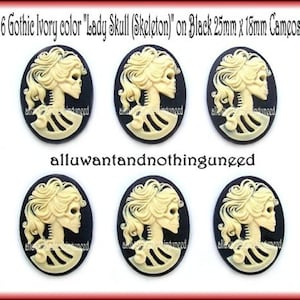 May include: Six ivory color "Lady Skull (Skeleton)" cameo buttons on black backgrounds. Each button is 25mm x 18mm.