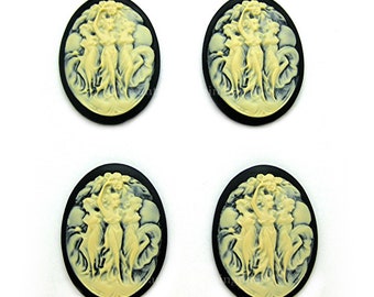 May include: Four oval cameo pendants with a black border and a cream-colored relief of three classical figures. The figures are in a flowing, draped style, set against a light background.
