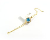 Classic Gold Evil Eye Bracelet with Blue Evil Eye Charm adorned with white CZ Zirkonia - Evil Eye bracelet arrives in a white gift box!