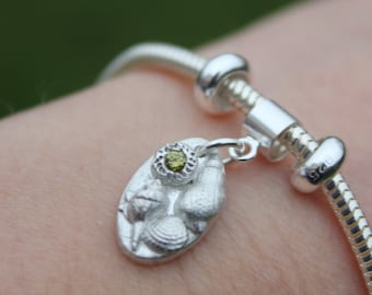 Sea shell charm bracelet charm, fits Pandora or Thomas Sabo, featuring tiny silver shells in a mini rockpool