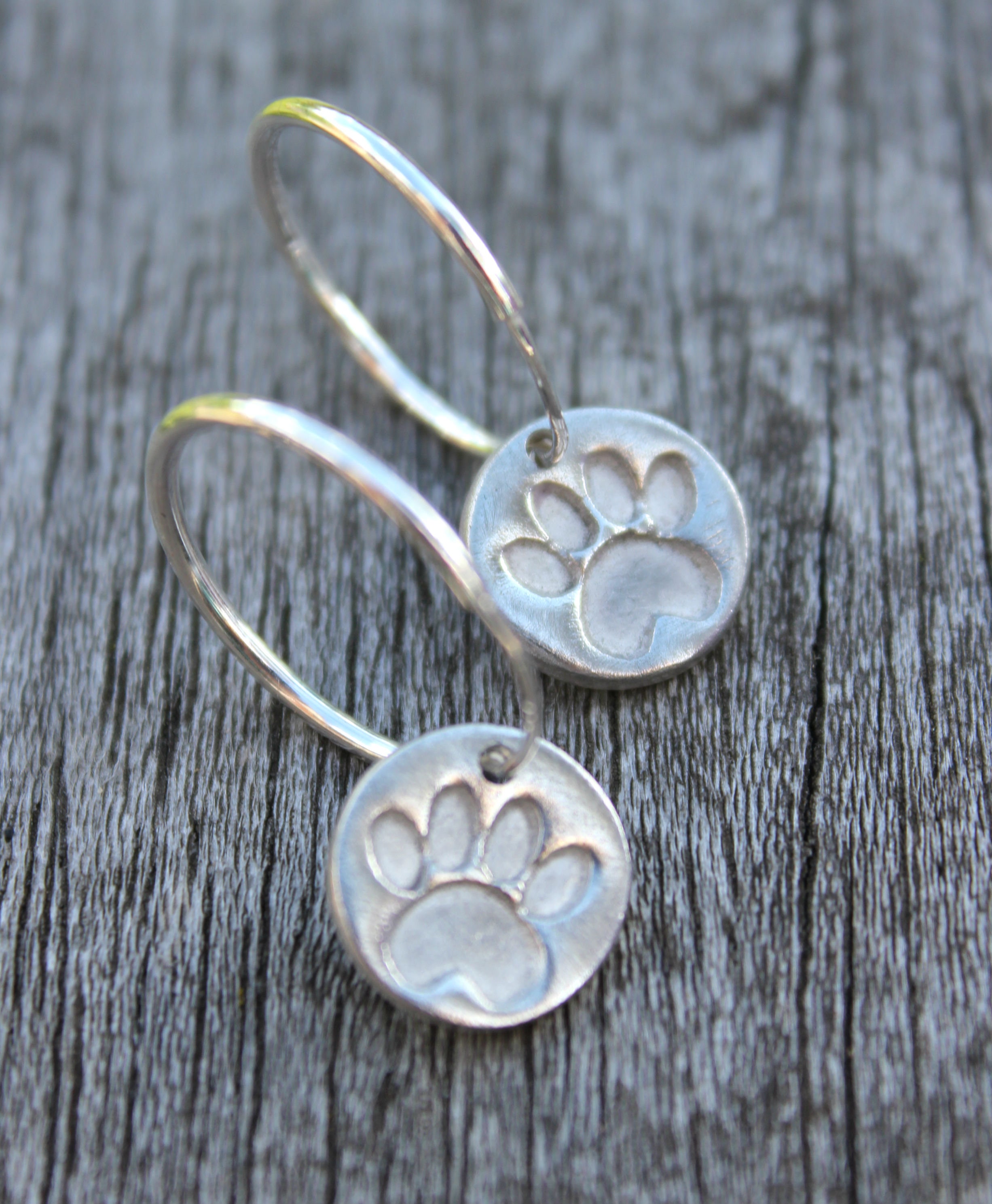tiny paw print earrings