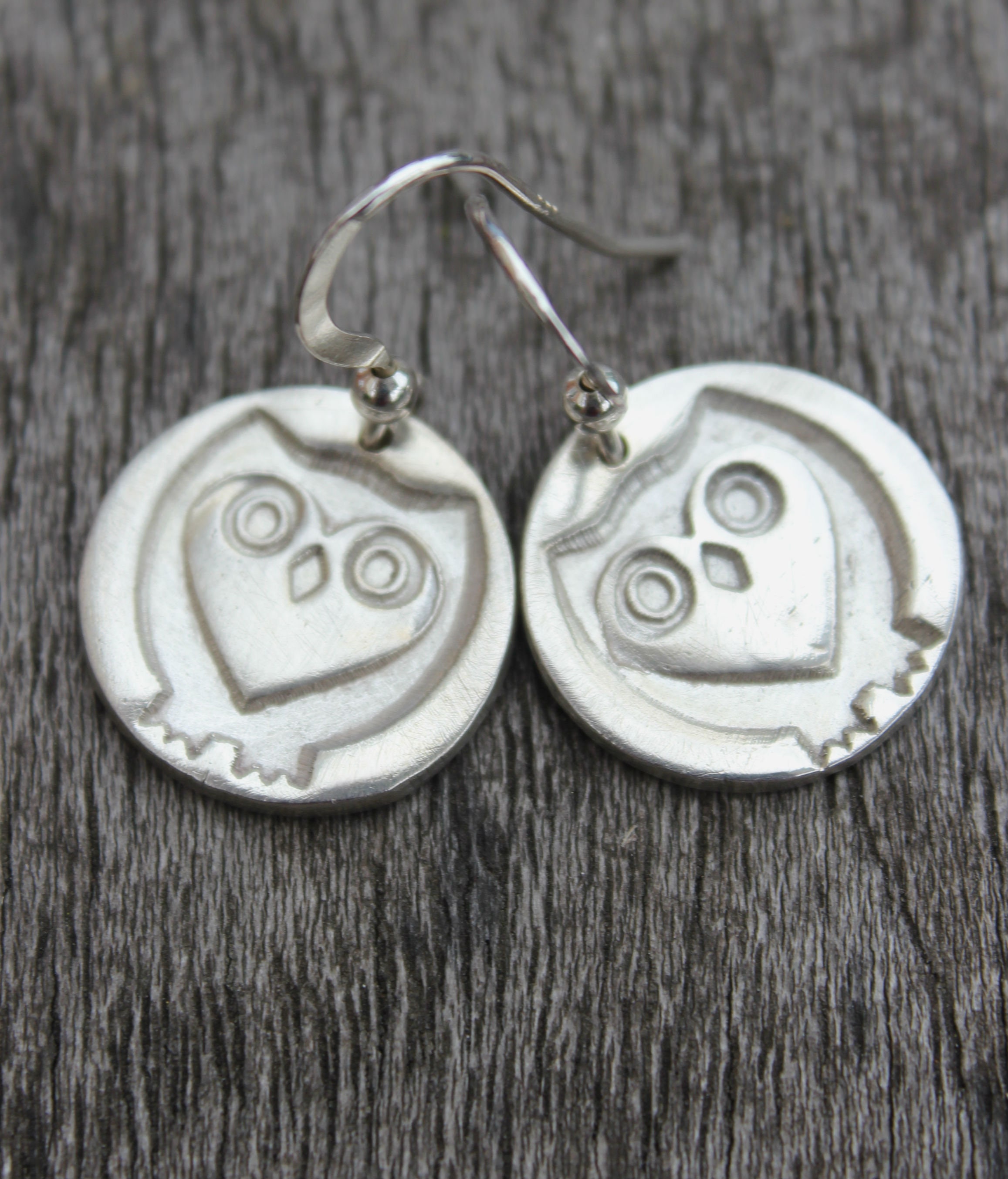 Silver owl earrings with a heart shaped face, handmade in UK