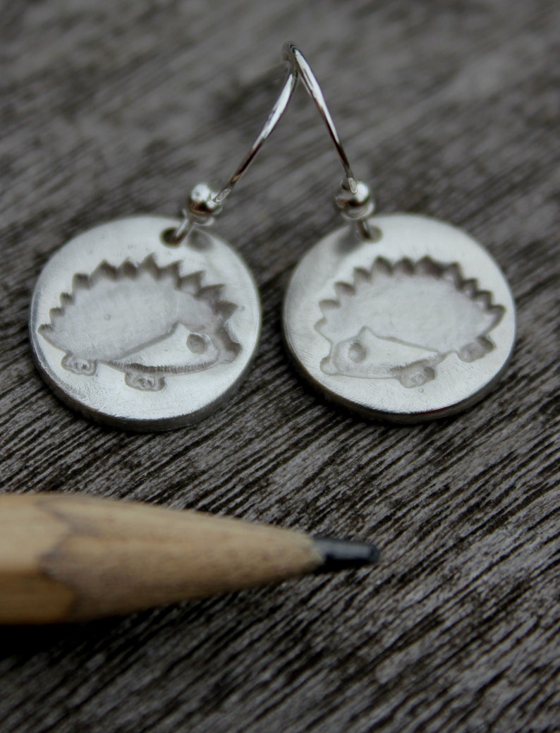 Hedgehog dangle earrings handmade in silver with an embossed hedgehog. Inspired by nature and wildlife. Perfect for a hedgehog lover. image 2