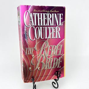 La sposa ribelle di Catherine Coulter, prima ristampa del 1994, copertina flessibile con rialzo.