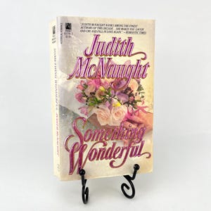 Qualcosa di meraviglioso di Judith McNaught Prima edizione 1988 Brossura con Stepback