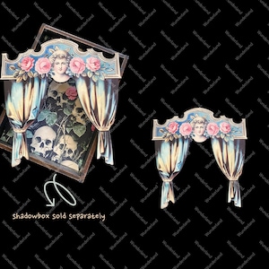 May include: A vintage-style shadowbox with a decorative frame and a scene of a woman with pink roses and blue curtains. The shadowbox is made of wood and has a distressed finish.