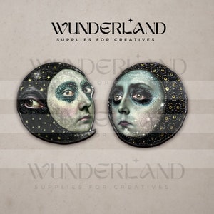 May include: Two black and gold crescent moon-shaped resin ornaments with painted faces and a starry sky background. The text "WUNDERLAND SUPPLIES FOR CREATIVES" is visible at the top and bottom of the image.