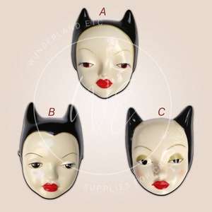 creepy but cute doll head cutouts for altered art/mixed media, vintage doll woodcuts, jewelry, pins assemblage art, embellishments supplies