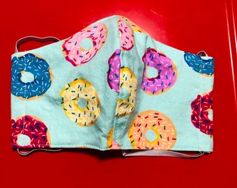 Face Mask Made From Blue Large Tossed Donuts Fabric