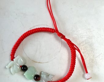 Bracelet en cordon tissé à la main, longueur ajustable, orné d'un pendentif en jadéite naturelle, d'un signe du zodiaque chinois et de perles en œil de tigre d'obsidienne.