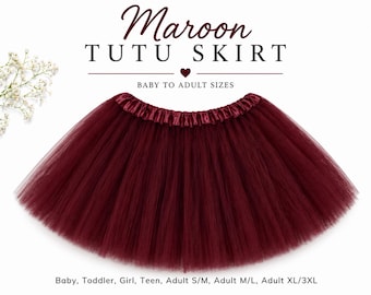 May include: A maroon tutu skirt with a gathered satin waistband. The text above reads Maroon TUTU SKIRT, and below it reads Baby to Adult Sizes. The bottom text lists sizes: Baby, Toddler, Girl, Teen, Adult S/M, Adult M/L, Adult XL/3XL.