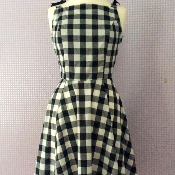 black and white checked pinafore dress