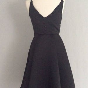 Audrey hepburn inspired v-shaped back fit and flare dress