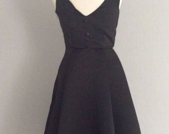 Audrey hepburn inspired v-shaped back fit and flare dress