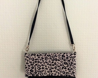 Leopard/animal print faux leather fold over handbag