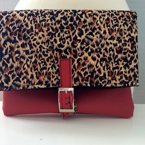 Red leatherette and leopard animal print fold over buckle clutch bag