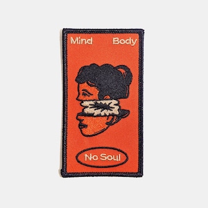 May include: Orange embroidered patch with a black and white illustration of a woman's face with the words "Mind", "Body", and "No Soul" in white.