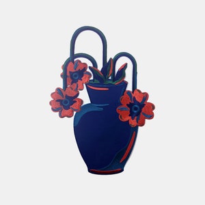 May include: A navy blue vase with red and blue flowers and green stems. The vase has two arched handles and is filled with green and red leaves. The flowers have a detailed, textured appearance, and the background is white.